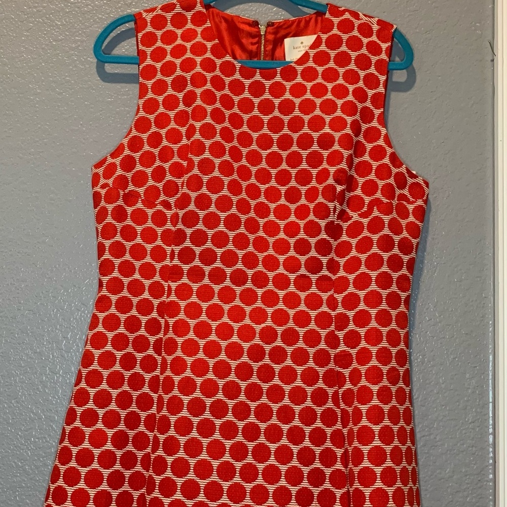 Orange and cream sleeveless dress